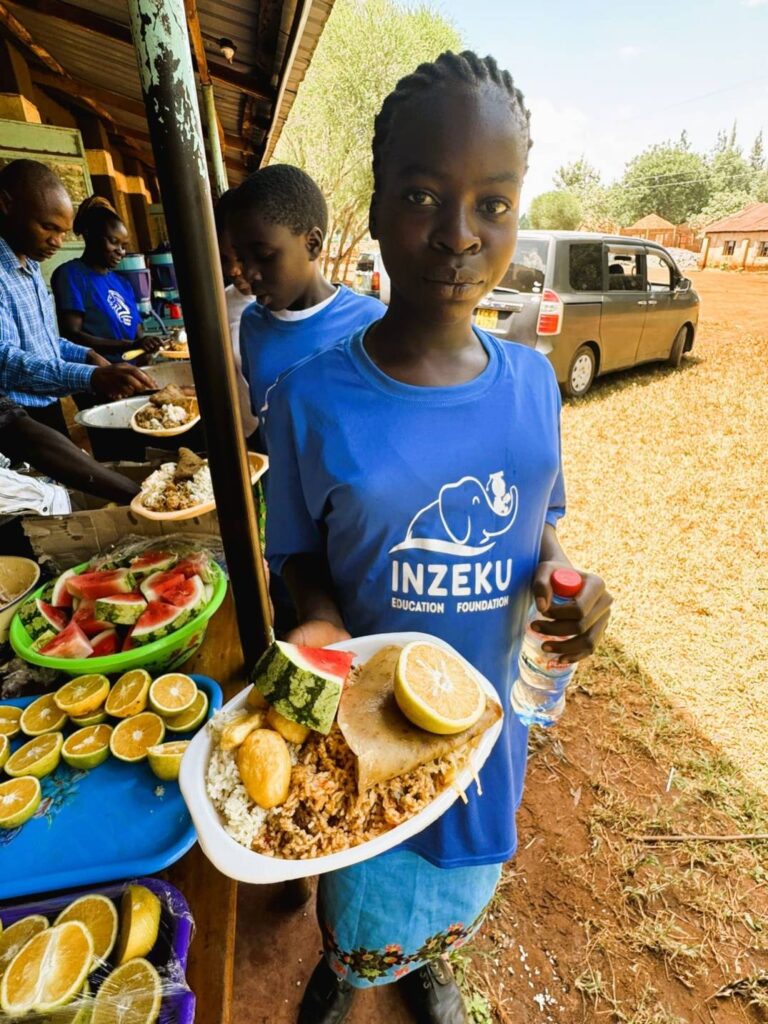 children in kenya - enjoying their lunch