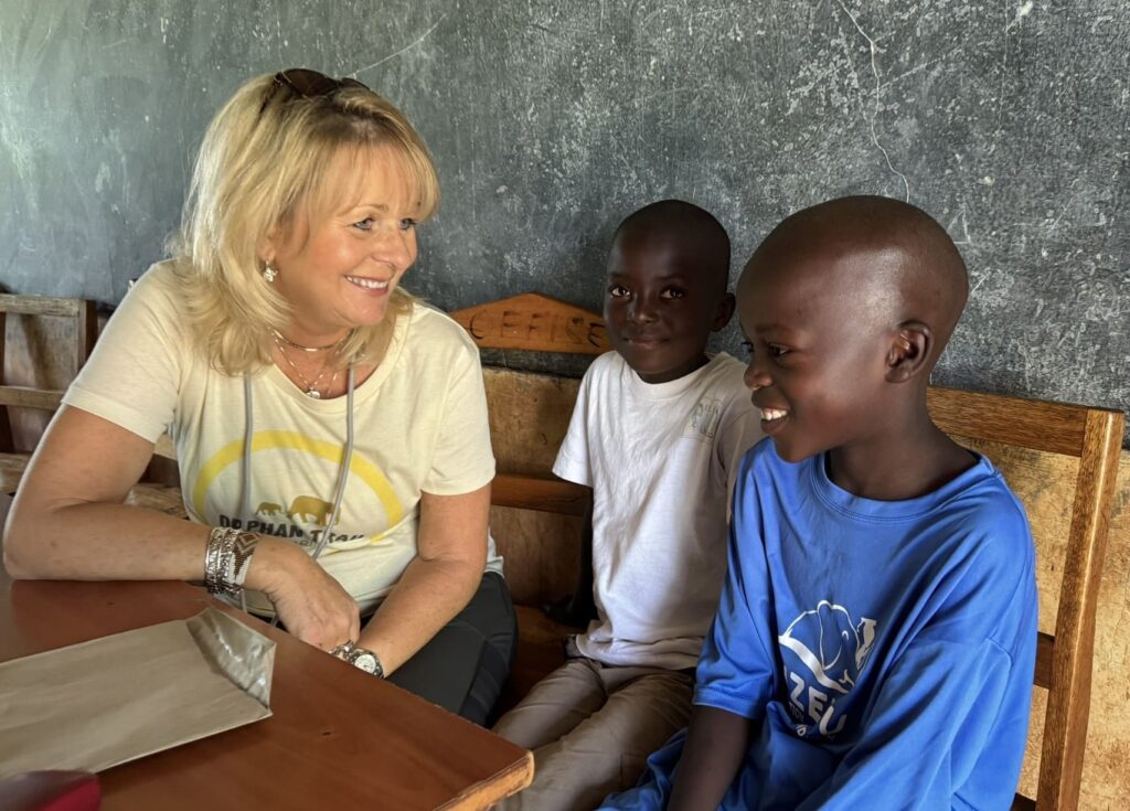 children in kenya - two pupils learning with beverly