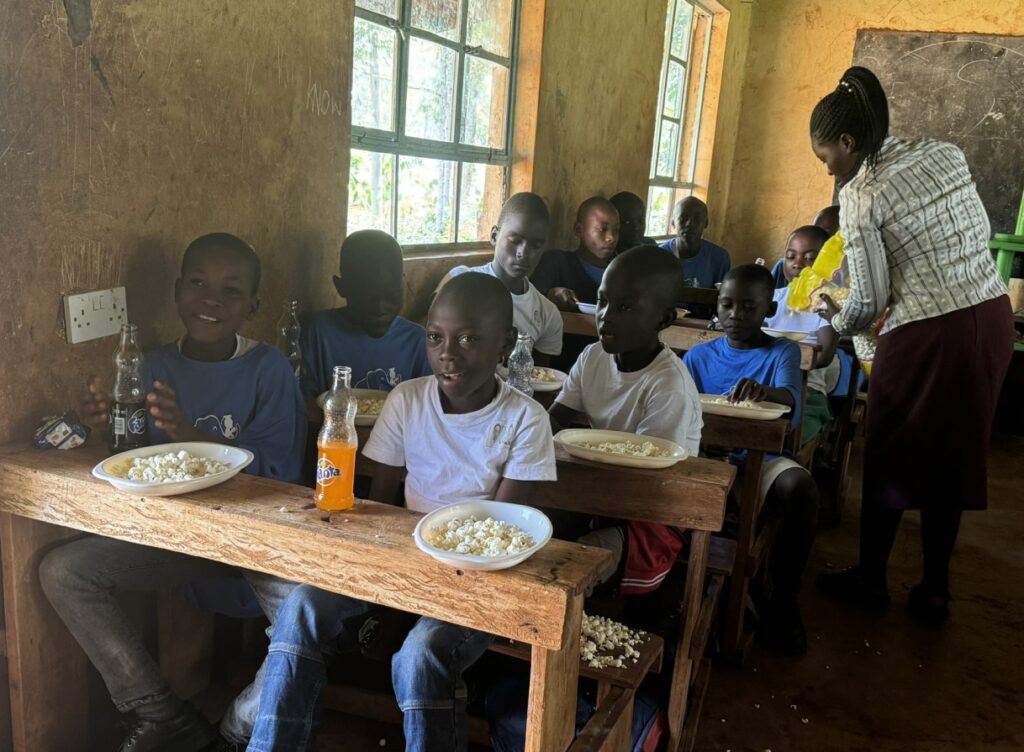 Inzeku education foundation - eating popcorn